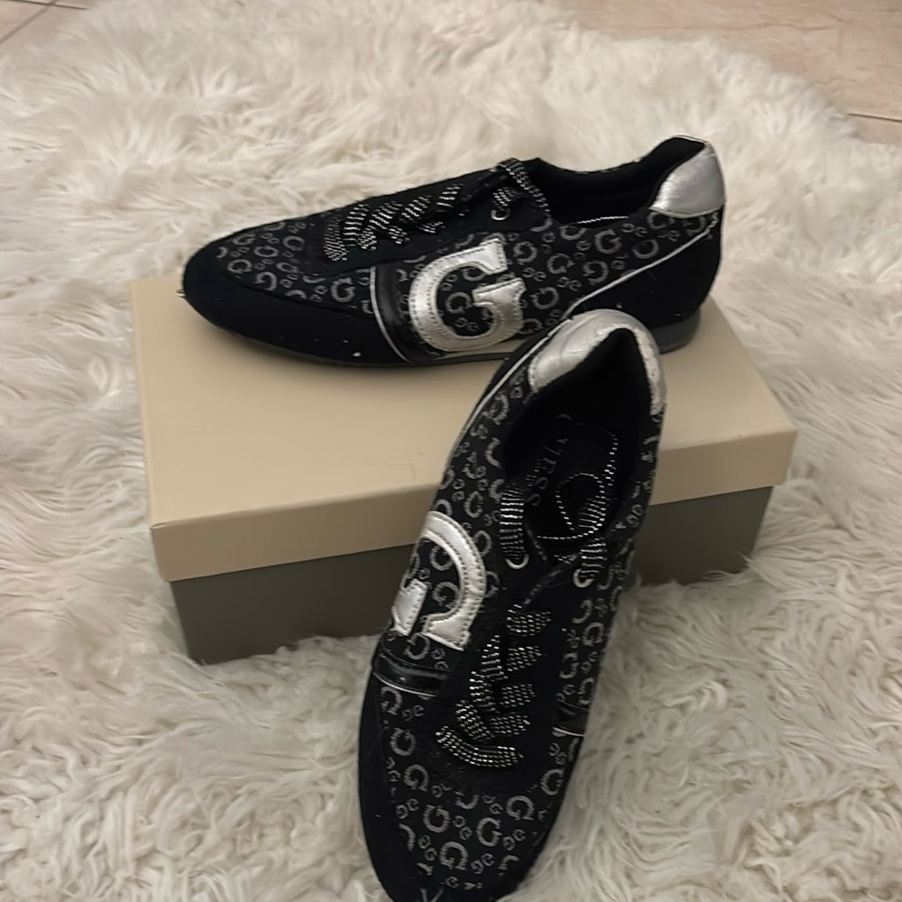 Guess black and silver women’s sneakers